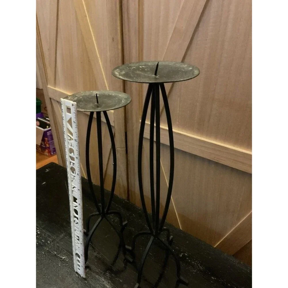 Set of black metal candle holders